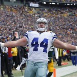 Dallas Cowboys fullback Tyler Clutts (44) celebrates a one-yard touchdown pass during the first half of an NFL divisional playoff football game against the Green Bay Packers Sunday, Jan. 11, 2015, in Green Bay, Wis. (AP Photo/Matt Ludtke)