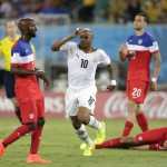 Ghana's Andre Ayew, centre, celebrates after scoring his sides first goal during the group G World Cup soccer match between Ghana and the United States at the Arena das Dunas in Natal, Brazil, Monday, June 16, 2014. (AP Photo/Dolores Ochoa)