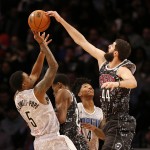 World Team's Nikola Mirotic, right, of the Chicago Bulls, blocks a shot by U.S. Team's Kentavious Caldwell-Pope, of the Detroit Pistons, during the second half of NBA basketball's Rising Stars Challenge, Friday, Feb. 13, 2015, in New York. (AP Photo/Julio Cortez)