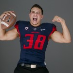 Arizona safety Jared Tevis poses for photos at the Pac-12 NCAA college football media days at Paramount Studios in Los Angeles, Wednesday, July 23, 2014. (AP Photo)