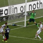 Germany's goalkeeper Manuel Neuer, second from right, makes a save after a shot by France's Blaise Matuidi, second from left, during the World Cup quarterfinal soccer match between Germany and France at the Maracana Stadium in Rio de Janeiro, Brazil, Friday, July 4, 2014. (AP Photo/Thanassis Stavrakis)