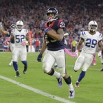 Houston Texans' Arian Foster (23) runs for a touchdown against the Indianapolis Colts during the second quarter of an NFL football game, Thursday, Oct. 9, 2014, in Houston. (AP Photo/Patric Schneider)