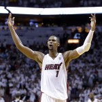 Miami Heat center Chris Bosh celebrates after the Heat defeated the Brooklyn Nets 94-82 in Game 2 of an Eastern Conference semifinal basketball game, Thursday, May 8, 2014 in Miami. (AP Photo/Wilfredo Lee)