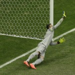 Brazil's goalkeeper Julio Cesar fails to stop a penalty kicked by Netherlands' Robin van Persie during the World Cup third-place soccer match between Brazil and the Netherlands at the Estadio Nacional in Brasilia, Brazil, Saturday, July 12, 2014. (AP Photo/Themba Hadebe)