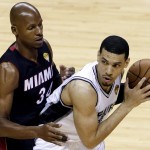  Miami Heat guard Ray Allen (34) defends San Antonio Spurs guard Danny Green during the first half in Game 5 of the NBA basketball finals on Sunday, June 15, 2014, in San Antonio. (AP Photo/Tony Gutierrez)