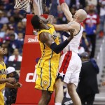  Washington Wizards center Marcin Gortat, right, shoots over Indiana Pacers center Roy Hibbert during the second half in Game 6 of an Eastern Conference semifinal NBA basketball playoff series in Washington, Thursday, May 15, 2014. (AP Photo/Alex Brandon)