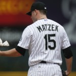 Colorado Rockies starting pitcher Tyler Matzek reacts after walking the bases loaded against the Arizona Diamondbacks in the first inning of the first game of a baseball doubleheader Wednesday, May 6, 2015, in Denver. (AP Photo/David Zalubowski)