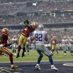 San Francisco 49ers inside linebacker Patrick Willis, second from left, intercepts a pass intended for Dallas Cowboys tight end Jason Witten (82) in the end zone during the first half of an NFL football game, Sunday, Sept. 7, 2014, in Arlington, Texas. (AP Photo/LM Otero)