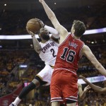 Cleveland Cavaliers guard Kyrie Irving (2) shoots against Chicago Bulls forward Pau Gasol (16) during the second half of Game 1 in a second-round NBA basketball playoff series Monday, May 4, 2015, in Cleveland. The Bulls won 99-92. (AP Photo/Tony Dejak)
