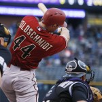 Arizona Diamondbacks first baseman Paul Goldschmidt (44) strikes out next to Colorado Rockies catcher Michael McKenry, right, to end the top of the first inning of the second game of a baseball doubleheader, Wednesday, May 6, 2015, in Denver. (AP Photo/David Zalubowski)