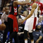 Toronto Raptors guard DeMar DeRozan (10) shoves Washington Wizards forward Otto Porter Jr. during the second half of Game 3 in the first round of the NBA basketball playoffs Friday, April 24, 2015, in Washington. DeRozan was charged with a technical foul. The Wizards won 106-99. (AP Photo/Alex Brandon)