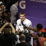 New England Patriots' Rob Gronkowski answers a question during media day for NFL Super Bowl XLIX football game Tuesday, Jan. 27, 2015, in Phoenix. (AP Photo/Charlie Riedel)
