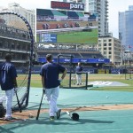 San Diego Padres' Justin Upton, left, and Will Middlebrooks interrupt their batting practice to watch the Kentucky Derby prior to a baseball game against the against the Colorado Rockies Saturday, May 2, 2015, in San Diego. (AP Photo/Lenny Ignelzi)