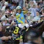 Victor Espinoza reacts after riding American Pharoah to victory in the 141st running of the Kentucky Derby horse race at Churchill Downs Saturday, May 2, 2015, in Louisville, Ky. (AP Photo/Matt Slocum)