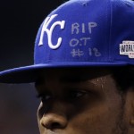 Kansas City Royals pitcher Yordano Ventura has an RIP O.T. #18 on his hat as he walks off the field during the first inning of Game 6 of baseball's World Series against the San Francisco Giants Tuesday, Oct. 28, 2014, in Kansas City, Mo. The writing was to honor St. Louis Cardinals outfielder Oscar Taveras who died Sunday in a car accident in his native Dominican Republic.(AP Photo/David J. Phillip)