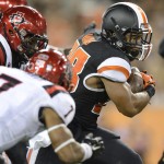 Oregon State tailback Terron Ward (28) picks up a first down against San Diego State during the second half of an NCAA college football game in Corvallis, Ore., Saturday, Sept. 20, 2014. (AP Photo/Troy Wayrynen)