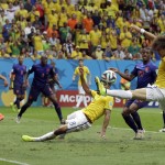 Brazil's David Luiz, right, misses a chance during the World Cup third-place soccer match between Brazil and the Netherlands at the Estadio Nacional in Brasilia, Brazil, Saturday, July 12, 2014. (AP Photo/Hassan Ammar)