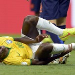 Brazil's Ramires reacts after getting fouled during the World Cup third-place soccer match between Brazil and the Netherlands at the Estadio Nacional in Brasilia, Brazil, Saturday, July 12, 2014. (AP Photo/Manu Fernandez)