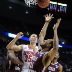 Texas Southern forward Malcolm Riley, right, battles for a rebound with Arizona center Kaleb Tarczewski during the first half in the second round of the NCAA college basketball tournament in Portland, Ore., Thursday, March 19, 2015. (AP Photo/Greg Wahl-Stephens)