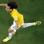 Brazil's David Luiz celebrates after scoring his side's second goal, during the World Cup quarterfinal soccer match between Brazil and Colombia at the Arena Castelao in Fortaleza, Brazil, Friday, July 4, 2014. (AP Photo/Fabrizio Bensch, pool)