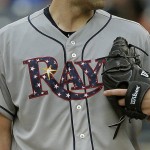 Wearing star spangled uniforms to commemorate the Fourth of July, Tampa Bay Rays pitcher Nathan Karns prepres to pitch against the New York Yankees during the second inning of a baseball game, Saturday, July 4, 2015, in New York. (AP Photo/Julie Jacobson)
