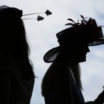 Fans walk to their seats before the 141st running of the Kentucky Derby horse race at Churchill Downs Saturday, May 2, 2015, in Louisville, Ky. (AP Photo/Matt Slocum)