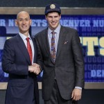 Creighton's Doug McDermott, right, poses for a photo with NBA Commissioner Adam Silver after being selected 11th overall by the Denver Nuggets during the 2014 NBA draft, Thursday, June 26, 2014, in New York. (AP Photo/Kathy Willens)