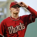 Arizona Diamondbacks starting pitcher Chase Anderson walks to the dugout after being removed from a baseball game against the Pittsburgh Pirates during the fourth inning in Pittsburgh, Wednesday, July 2, 2014. (AP Photo/Gene J. Puskar)
