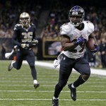 Baltimore Ravens running back Justin Forsett (29) carries for a touchdown ahead of New Orleans Saints defensive back Marcus Ball (36) in the second half of an NFL football game in New Orleans, Monday, Nov. 24, 2014. (AP Photo/Jonathan Bachman)