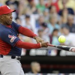 Former St. Louis Cardinals shortstop Ozzie Smith bats during the All-Star Legends & Celebrity Softball Game, Sunday, July 13, 2014, in Minneapolis. (AP Photo/Paul Sancya)
