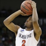  San Diego State's Xavier Thames shoots against North Dakota State in the first half during the third round of the NCAA men's college basketball tournament in Spokane, Wash., Saturday, March 22, 2014. (AP Photo/Elaine Thompson)