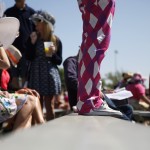 A fan wears pink pants before the 141th running of the Kentucky Oaks horse race at Churchill Downs Friday, May 1, 2015, in Louisville, Ky. (AP Photo/Jeff Roberson)