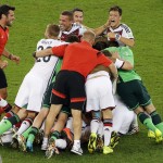 Germany's players celebrate after winning in extra time during the World Cup final soccer match between Germany and Argentina at the Maracana Stadium in Rio de Janeiro, Brazil, Sunday, July 13, 2014. Germany won 1-0. (AP Photo/Themba Hadebe)