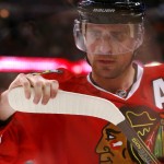  Chicago Blackhawks left wing Patrick Sharp checks the blade of his stick during a break in play during the second period in Game 3 of a first-round NHL hockey Stanley Cup playoff series game against the St. Louis Blues Monday, April 21, 2014, in Chicago. (AP Photo/Charles Rex Arbogast)