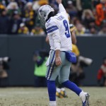 Dallas Cowboys quarterback Tony Romo celebrates after thrown a 38-yard touchdown pass to wide receiver Terrance Williams during the first half of an NFL divisional playoff football game against the Green Bay Packers Sunday, Jan. 11, 2015, in Green Bay, Wis. (AP Photo/Mike Roemer)