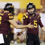 Arizona State's Zane Gonzalez (5) celebrates his field goal against Utah with teammate Mike Bercovici (2) in the first half of an NCAA college football game on Saturday, Nov. 1, 2014, in Tempe, Ariz. (Photo/Ross D. Franklin)