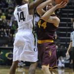 Arizona State's Kodi Justice (44) works against Oregon's Ahmaad Rorie (14) during the first half of an NCAA college basketball game in Corvallis, Ore., Saturday, Jan. 10, 2015. (AP Photo/Greg Wahl-Stephens)