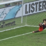  Mexico's goalkeeper Guillermo Ochoa fails to save a shot by Netherlands' Klaas-Jan Huntelaar from the penalty spot during the World Cup round of 16 soccer match between the Netherlands and Mexico at the Arena Castelao in Fortaleza, Brazil, Sunday, June 29, 2014. Holland won 2-1 and advanced to the quarterfinal. (AP Photo/Themba Hadebe)