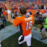 Denver Broncos quarterback Peyton Manning (18) leaves the field after an NFL football game against the Arizona Cardinals, Sunday, Oct. 5, 2014, in Denver. The Broncos won 41-20. (AP Photo/Jack Dempsey)