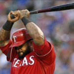 Texas Rangers' Prince Fielder lifts his bat over his head after flying out to right off of a pitch from Arizona Diamondbacks' Robbie Ray during the fourth inning of a baseball game Tuesday, July 7, 2015, in Arlington, Texas. (AP Photo/Tony Gutierrez)