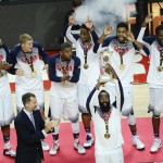 United States' James Harden lifts the trophy after winning the final World Basketball match between the United States and Serbia at the Palacio de los Deportes stadium in Madrid, Spain, Sunday, Sept. 14, 2014. (AP Photo/Manu Fernandez)