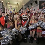The Tampa Bay Buccaneers cheerleaders celebrate along with fans after the team drafted former Florida State quarterback Jameis Winston during an NFL draft party Thursday, April 30, 2015, in Tampa, Fla. Winston was the first overall pick in the draft. (AP Photo/Chris O'Meara)