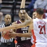 Texas Southern forward Malcolm Riley, left, is defended by Arizona forward Brandon Ashley during the first half in the second round of the NCAA college basketball tournament in Portland, Ore., Thursday, March 19, 2015. (AP Photo/Greg Wahl-Stephens)
