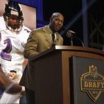 Former NFL player Duane Starks announces that the Baltimore Ravens select Minnesota tight end Maxx Williams as the 55th pick in the second round of the 2015 NFL Football Draft, Friday, May 1, 2015, in Chicago. (AP Photo/Charles Rex Arbogast)