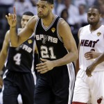 San Antonio Spurs forward Tim Duncan (21) gestures during the first half in Game 3 of the NBA basketball finals against the Miami Heat, Tuesday, June 10, 2014, in Miami. (AP Photo/Wilfredo Lee)
