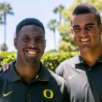 Oregon linebacker Derrick Malone, left, and quarterback Marcus Mariota pose for a photo at the Pac-12 NCAA college football media days at Paramount Studios in Los Angeles, Wednesday, July 23, 2014. (AP Photo)