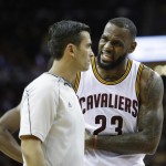 Cleveland Cavaliers forward LeBron James (23) talks with referee Zach Zarba (28) during the first half of Game 6 of basketball's NBA Finals against the Golden State Warriors, in Cleveland, Tuesday, June 16, 2015. (AP Photo/Tony Dejak)
