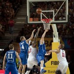 United States's DeMarcus Cousins third left, tries to dunk between Finland's Mikko Koivisto, left, during the Group C Basketball World Cup match between United States and Finland, in Bilbao northern Spain, Saturday, Aug. 30, 2014. The 2014 Basketball World Cup competition will take place in various cities in Spain from Aug. 30 through to Sept. 14. (AP Photo/Alvaro Barrientos)