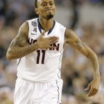Connecticut guard Ryan Boatright reacts during the first half of the NCAA Final Four tournament college basketball championship game against Kentucky Monday, April 7, 2014, in Arlington, Texas. (AP Photo/Eric Gay)
