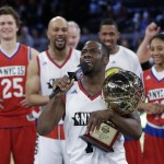 Kevin Hart reacts after being named game MVP of the NBA All-Star celebrity basketball game Friday, Feb. 13, 2015, in New York. (AP Photo/Frank Franklin II)
